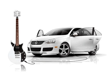 2006 Volkswagen Jetta with First Act Guitar 1